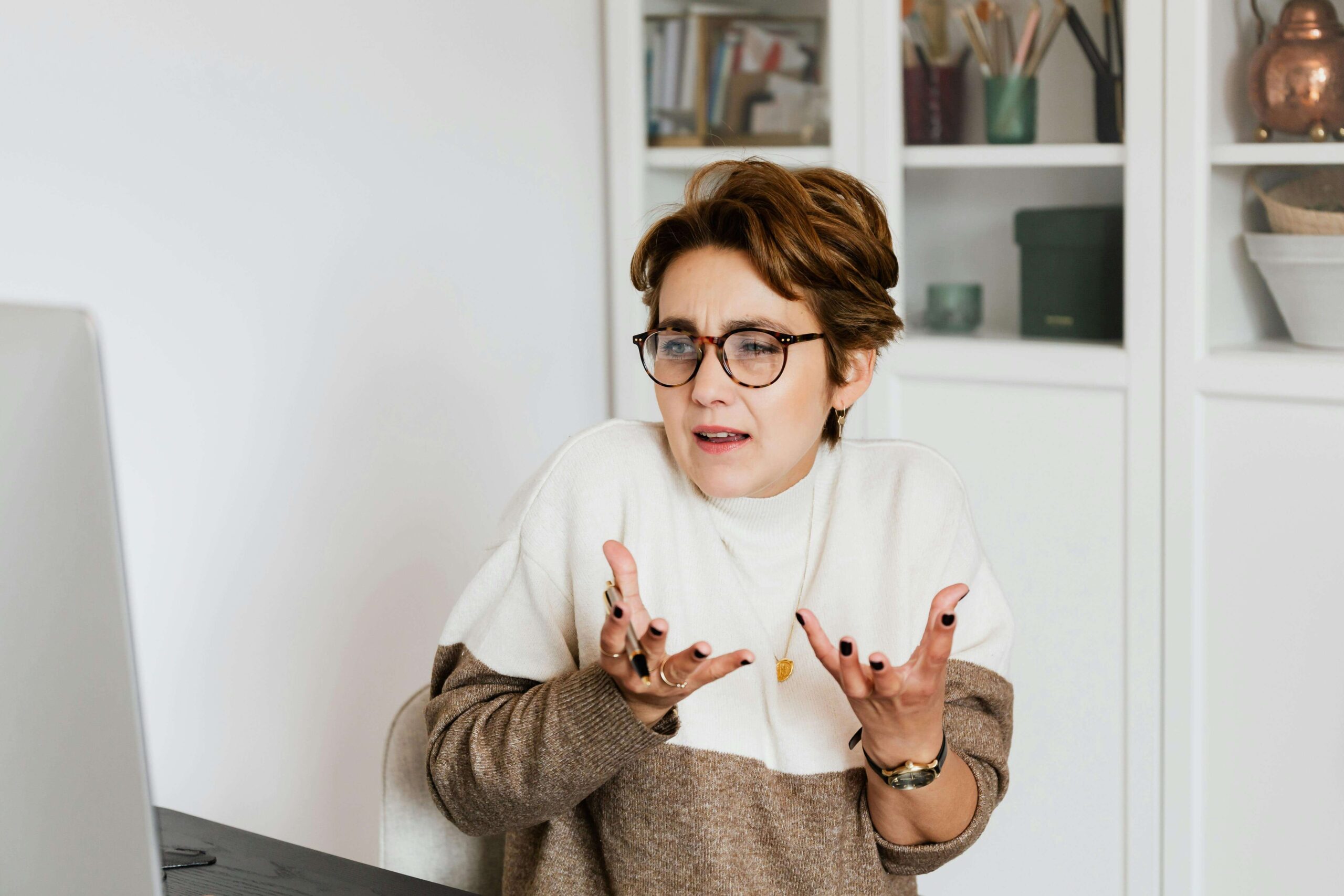 Woman confused looking at computer